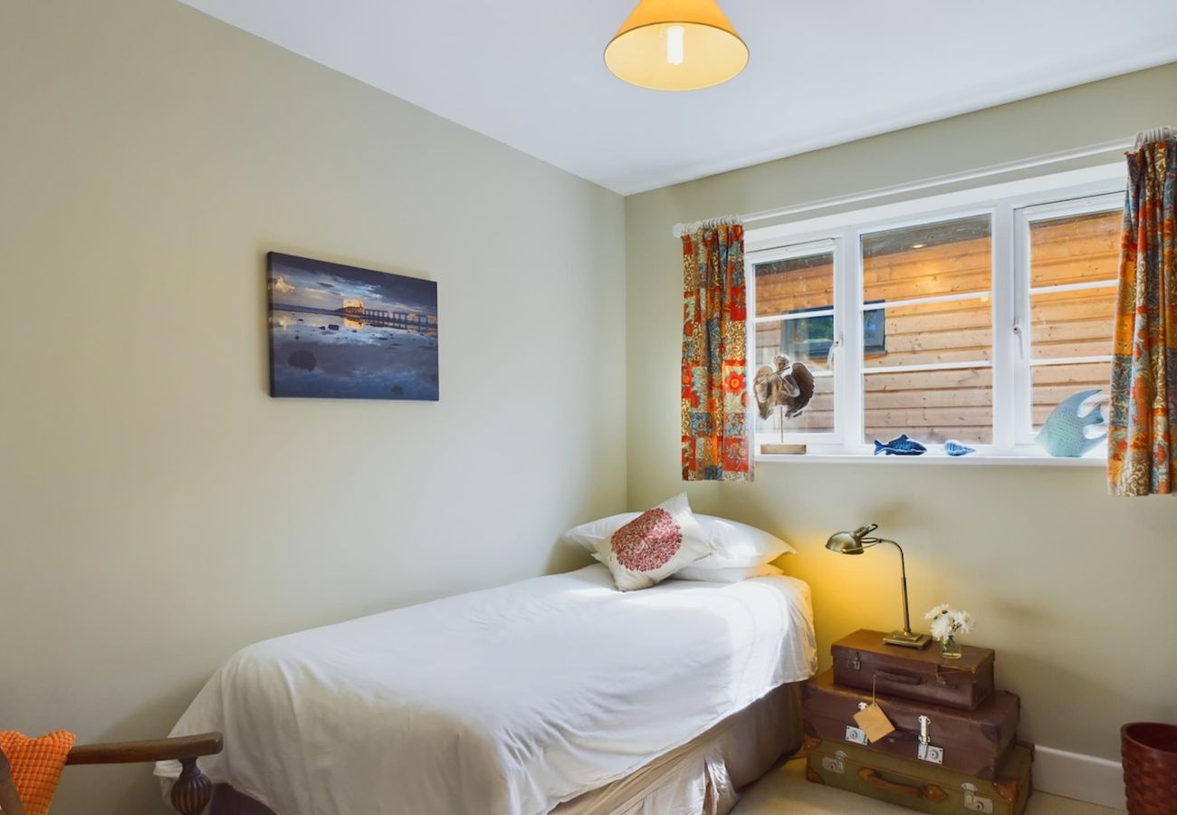 Bedroom 4 is on the ground floor of luxury coastal retreat, sleeping 8 guests on the Isle of Wight