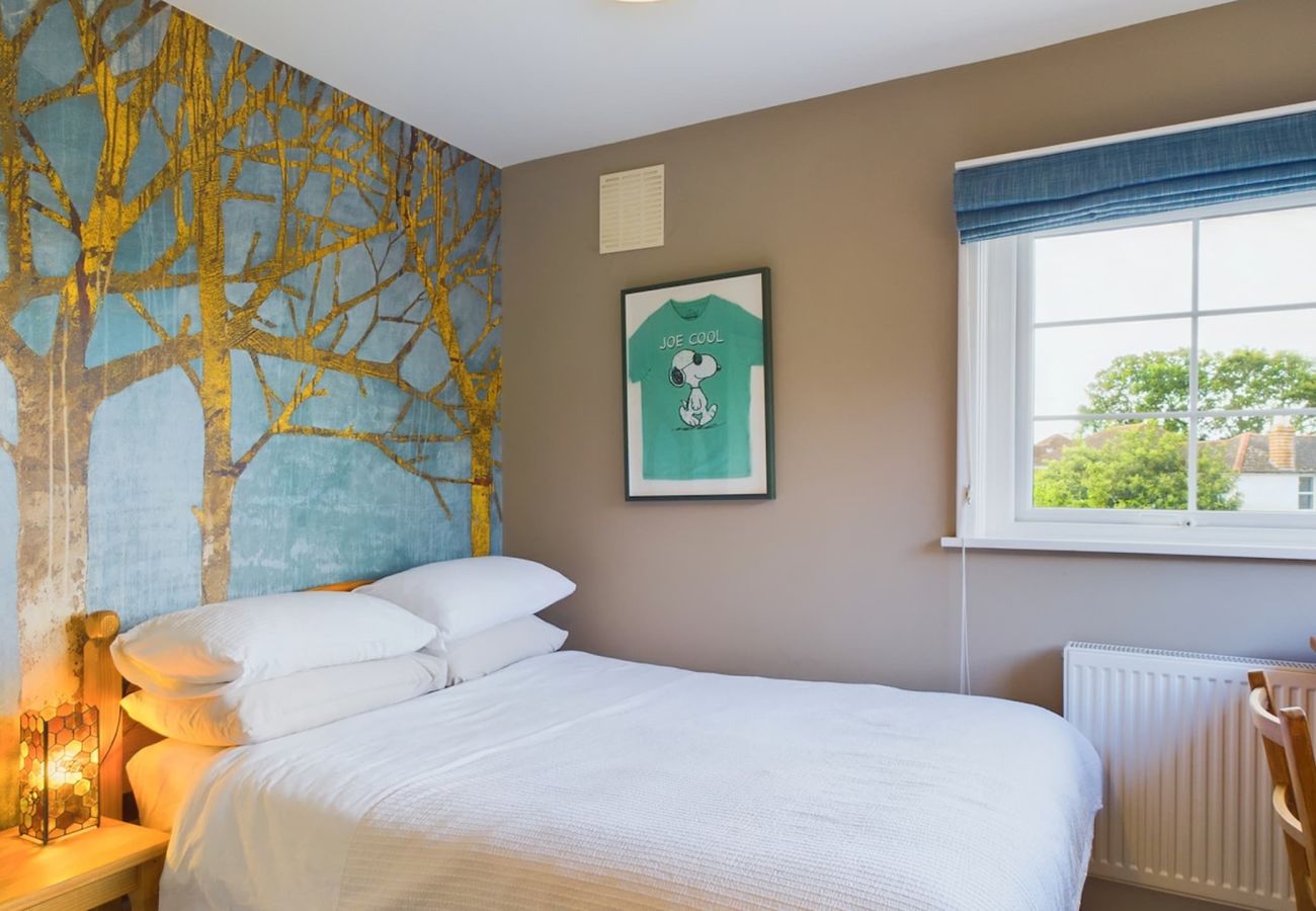 A double bedroom on the first-floor of The Timbers, luxury coastal retreat in Seaview